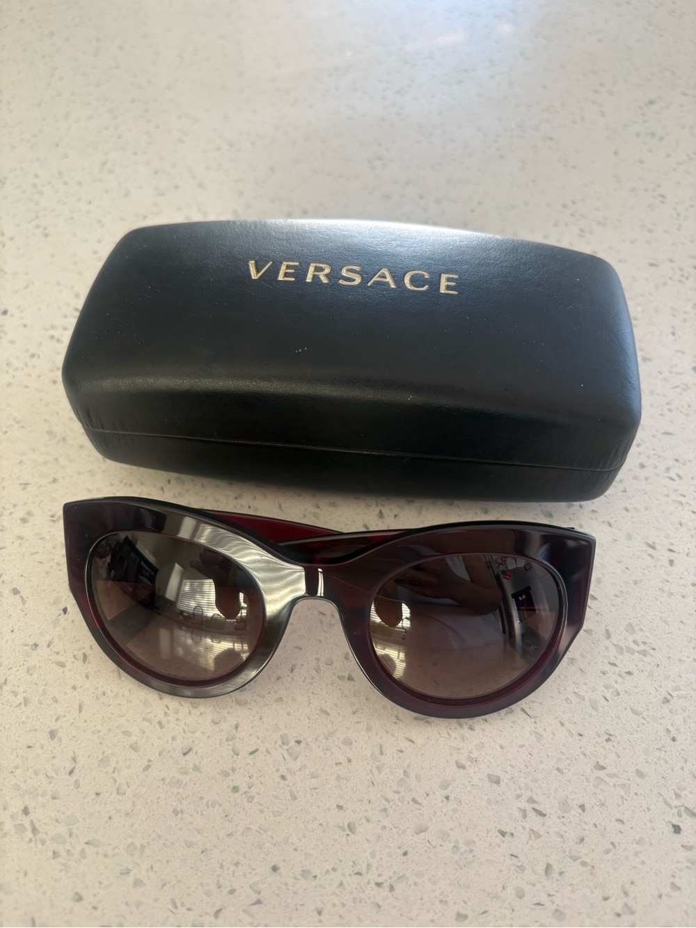 Versace Women's Cat-Eye Sunglasses in Deep Burgundy Frame with red stones flower
